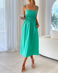 Solid color halter length dress with pleated straps