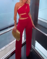 One shoulder solid color hollow jumpsuit